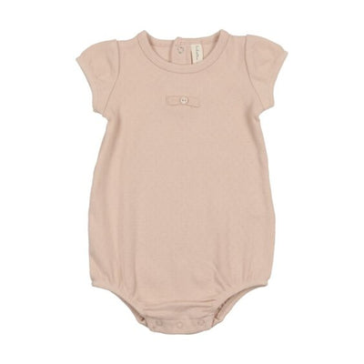 Shell pink pinpoint romper by Lilette