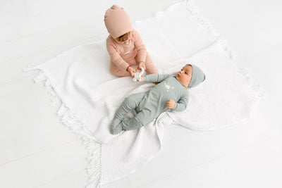 Cloud blue graphic footie by Pouf