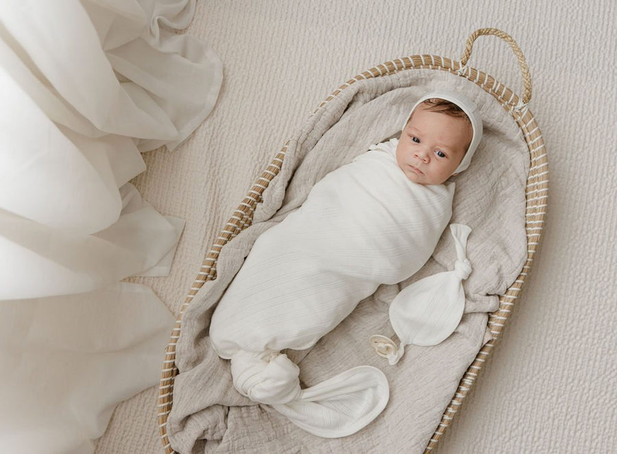 Pointelle cream blanket by Ely's & Co