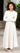 Cream pleated buckle skirt by Coco Blanc