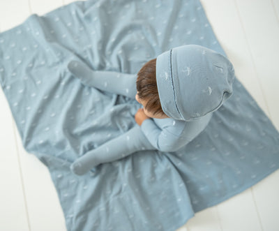 Embroidered blue footie + beanie by Bee & Dee