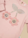 Smile flower puff top by Hux Baby