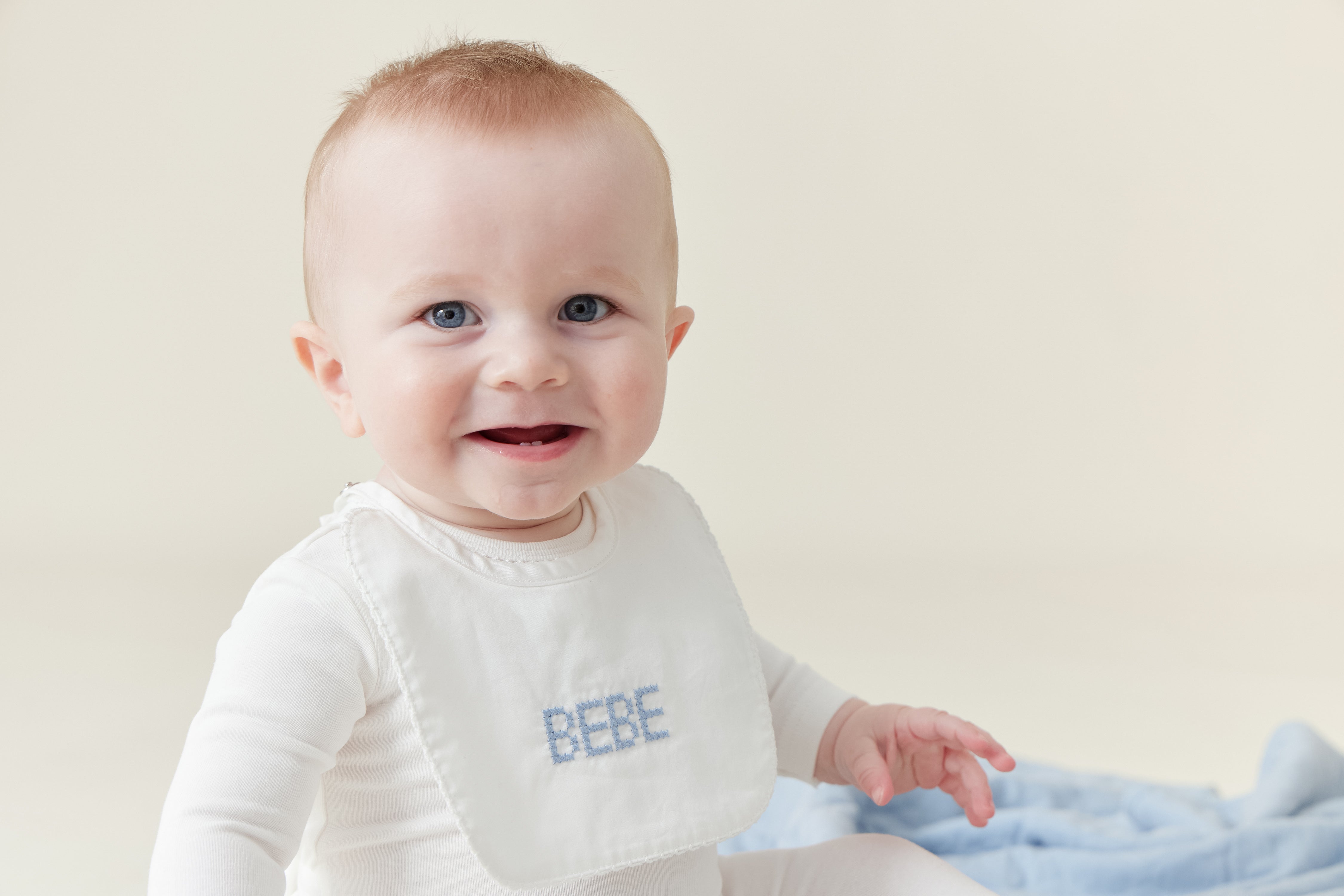 Bebe blue stitch bib by Kipp Baby