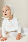 Bebe pink stitch bib by Kipp Baby