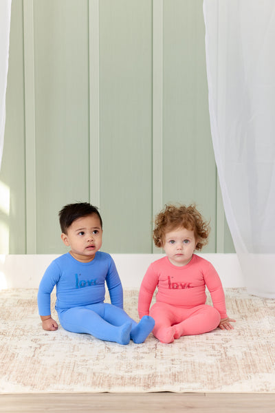 Love blue footie by Kipp Baby
