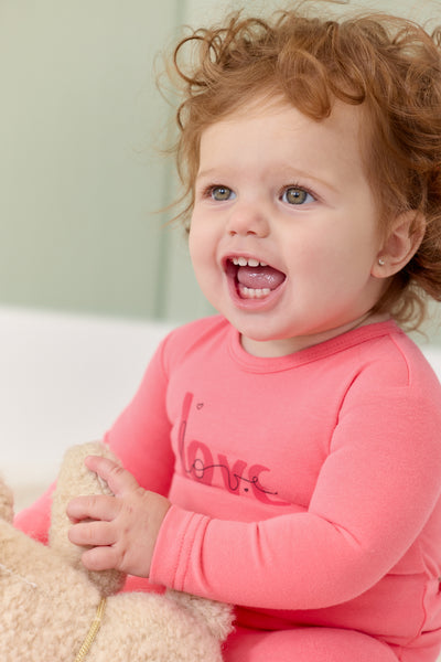 Love pink footie by Kipp Baby