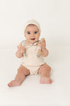 Ditsy knit pink romper by Bee & Dee