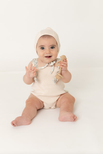 Ditsy knit pink romper by Bee & Dee