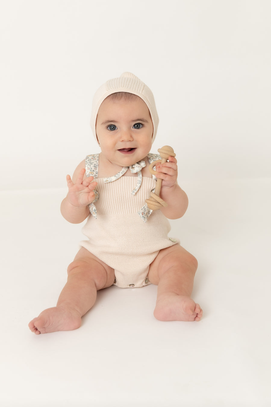 Ditsy knit pink romper by Bee & Dee