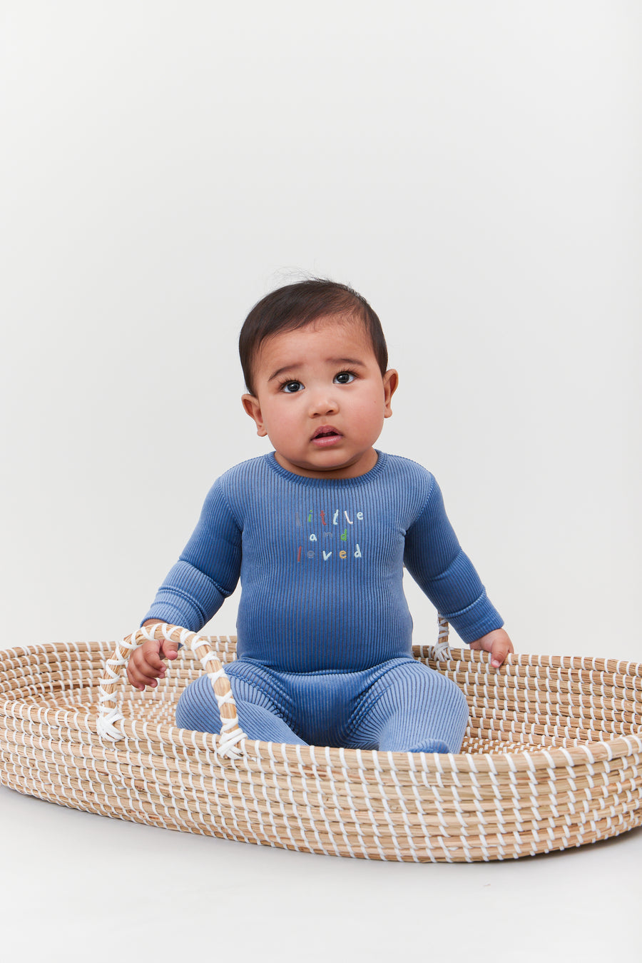 Little and loved blue footie by Kipp Baby