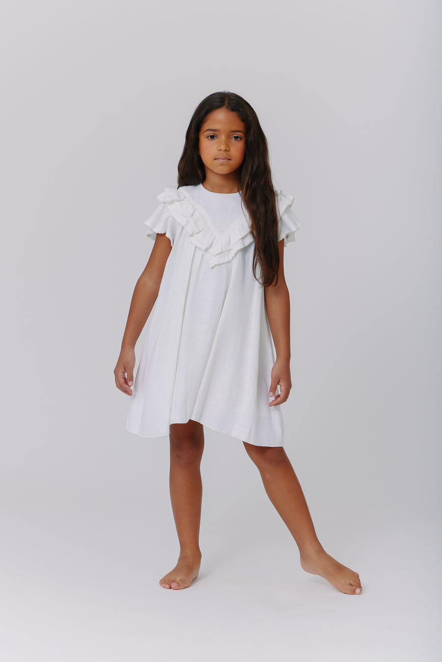 Linen white ruffle dress by Kipp