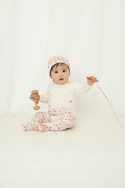 Scattered print white/red footie + beanie by Bee & Dee