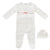 String red bow footie by Kipp Baby