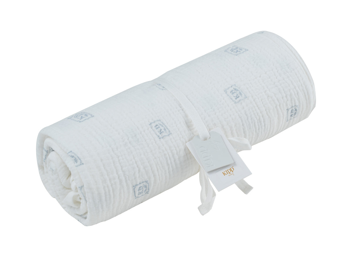 Kipp Baby KB blue logo swaddle - Flying Colors