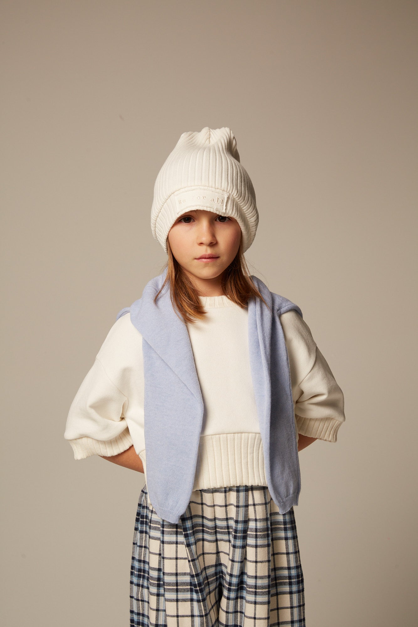 White trim sweater by Be For All