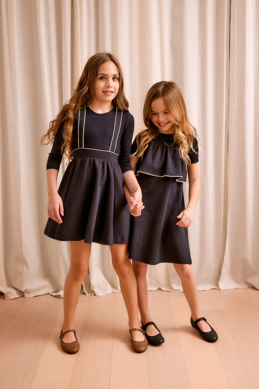 Navy tank dress with ruffle by Little Parni