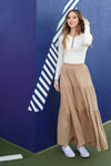 Beige ribbed tiered maxi skirt by Luna Mae